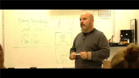 Life! Camera Action — a still from the film — professor