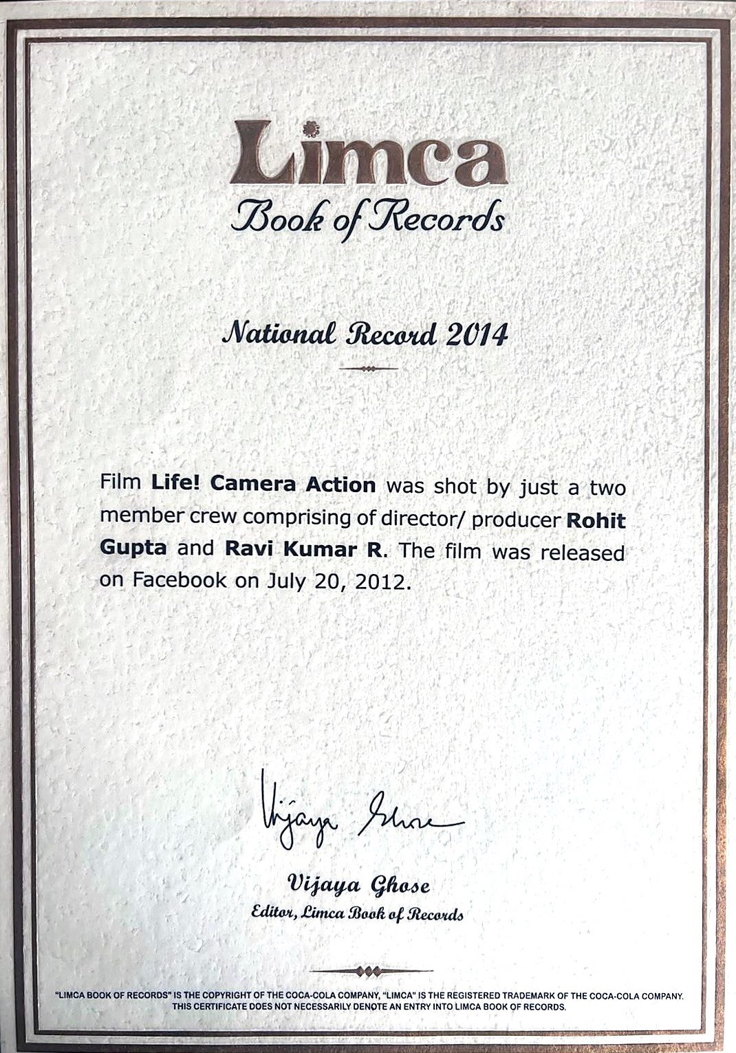 Limca Book of Records certificate, National Record 2014: Life! Camera Action was shot by a two-member crew, director-producer Rohit Gupta and Ravi Kumar R, and released on Facebook on 20 July 2012. Signed by Vijaya Ghose, Editor.